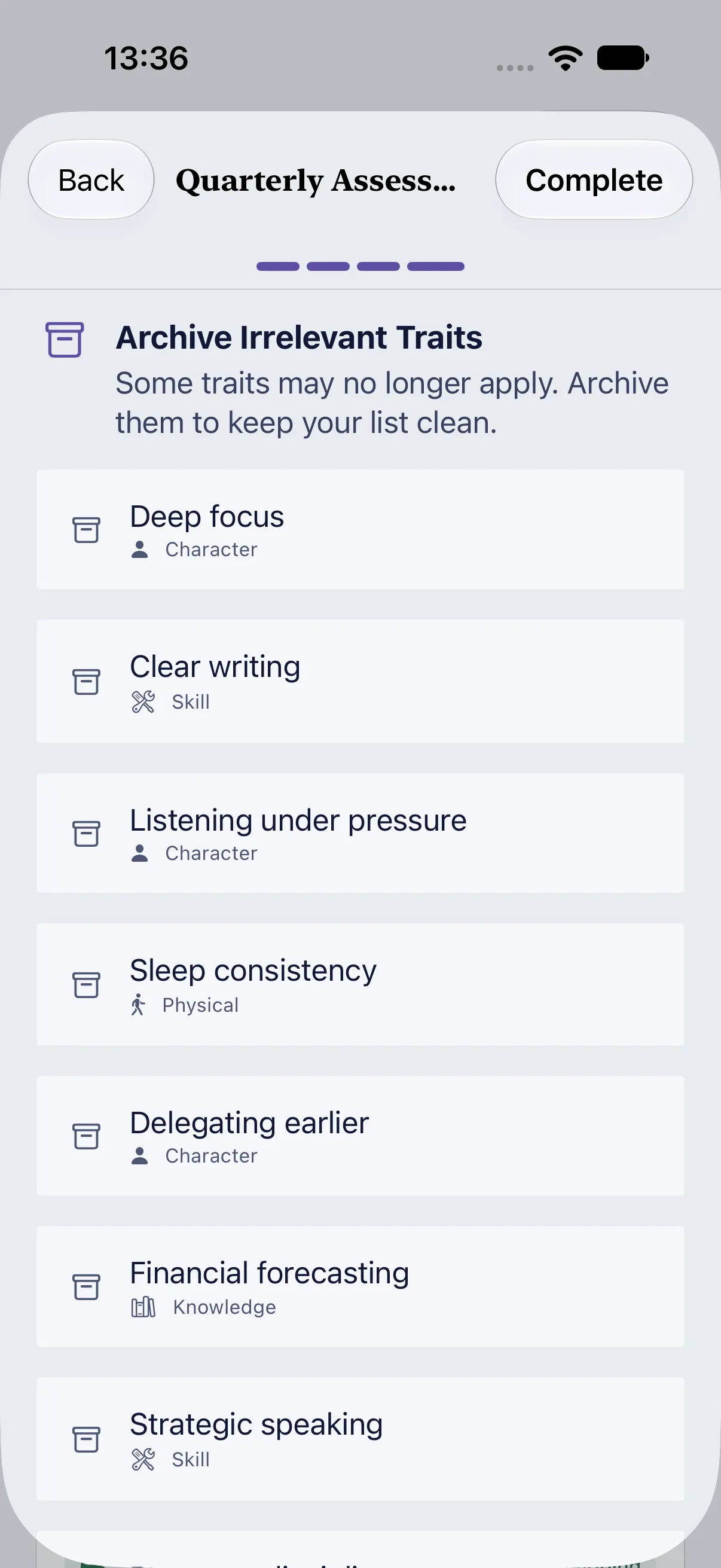 HourLife Traits: The last step, “Archive Irrelevant Traits”, with each trait and its category, ready to tap.