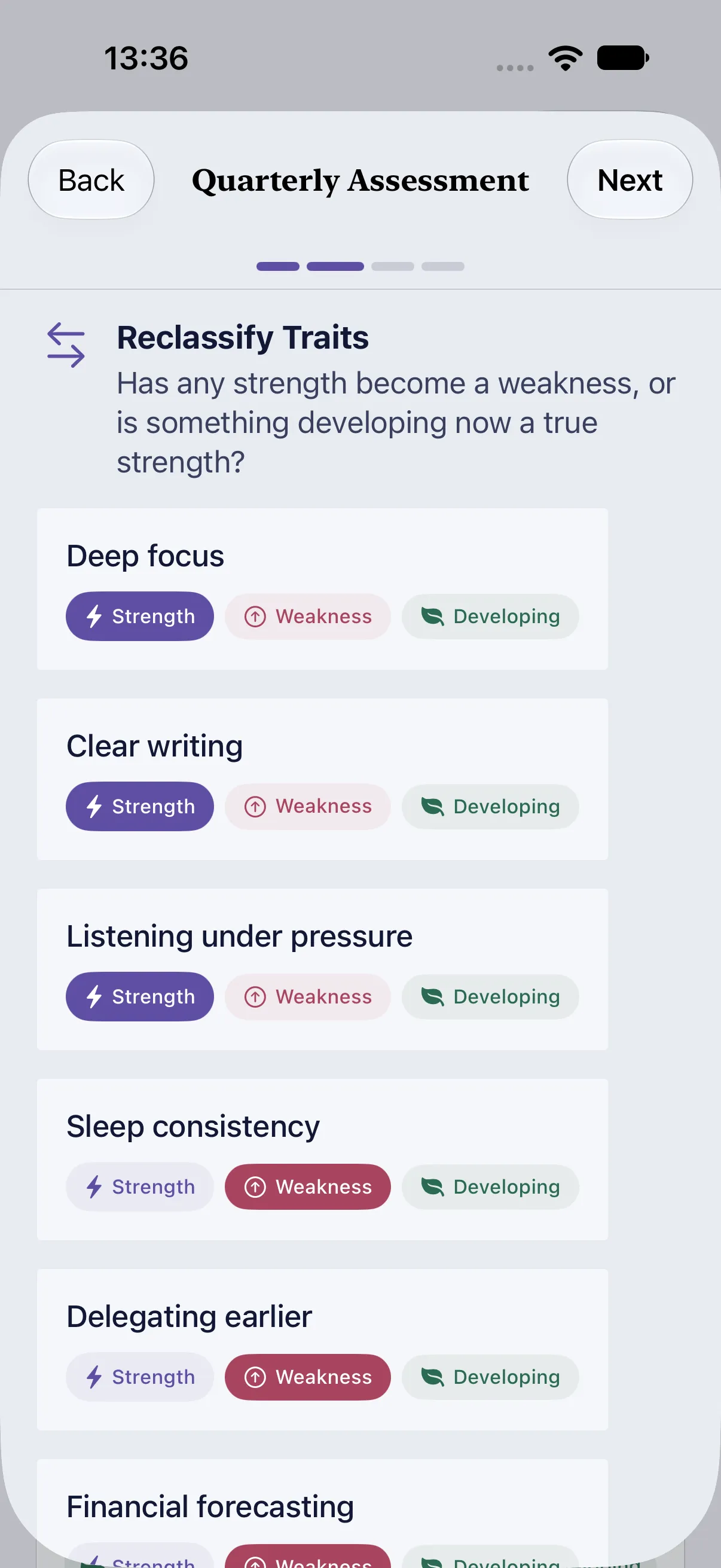 HourLife Traits: The second step, “Reclassify Traits”, with Strength, Weakness, and Developing for each trait.